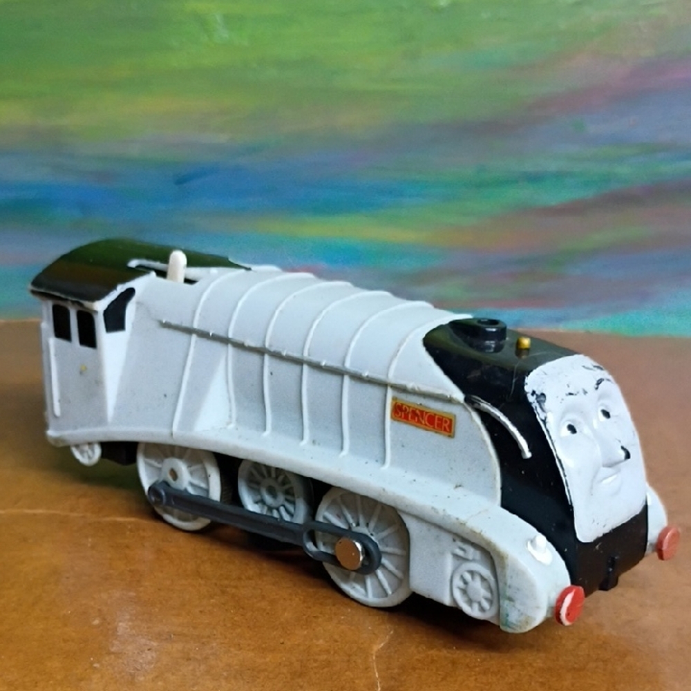 Spencer's's Sleek Black and White Toy Train